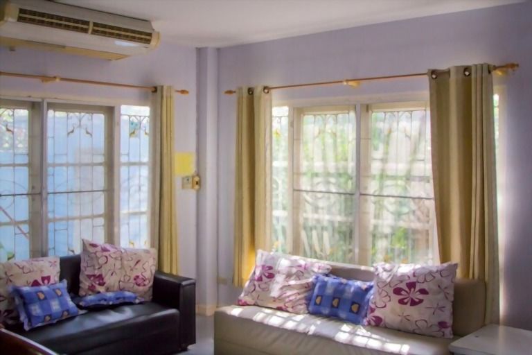 How can I make my window seat more comfortable?